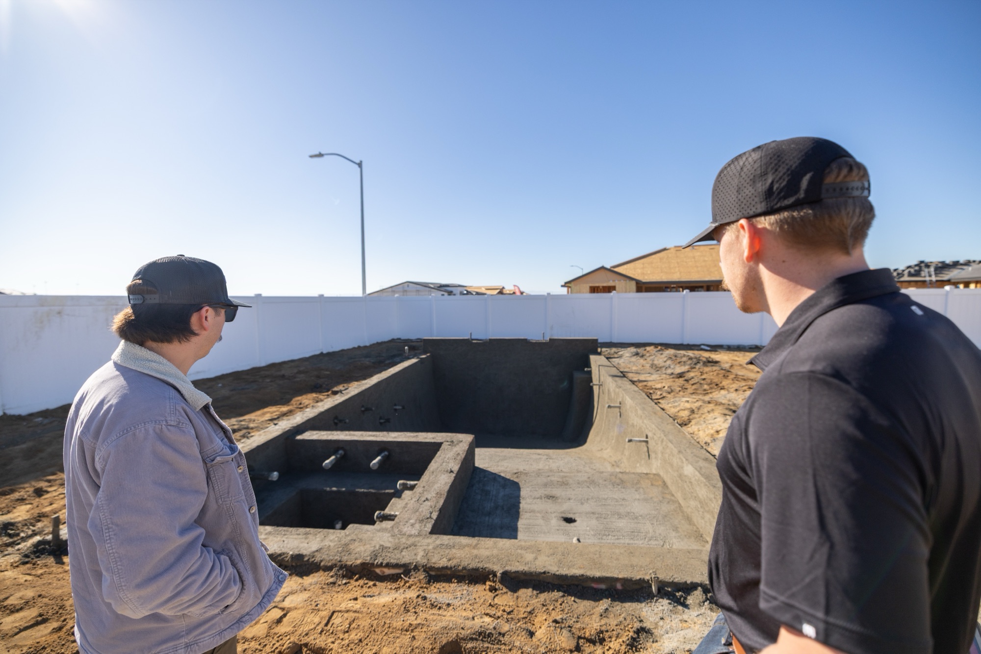 Gunite pool under construction — steel rebar cage and concrete work